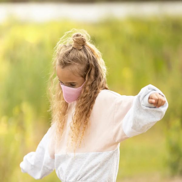 Child wearing Airpop Reusable Childrens Face Mask Blue