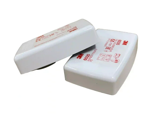 3M 6035 P3 R Filters shown at an angle, highlighting the enclosed design for rugged environments. Offers high-efficiency filtration against particulate hazards, fitting securely via the 3M bayonet connection system.